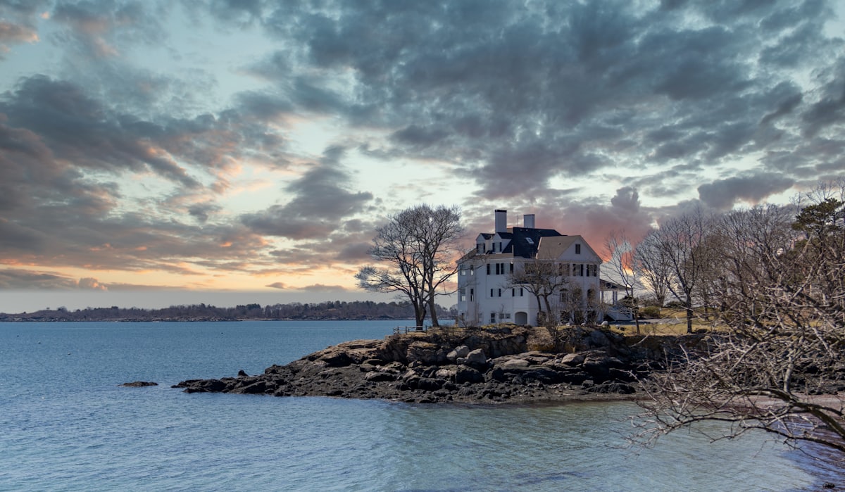 House by the water at dusk